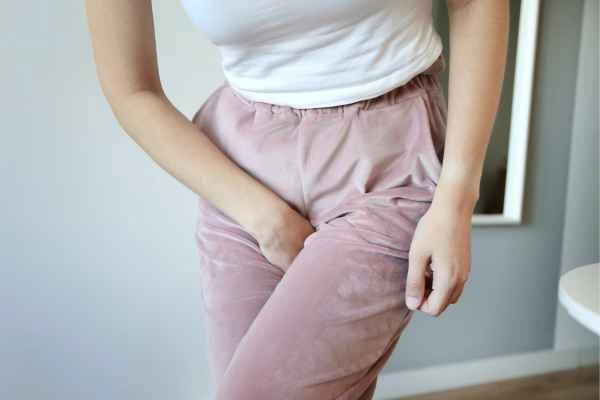woman running for the toilet because of urinary incontinence Bridgnorth